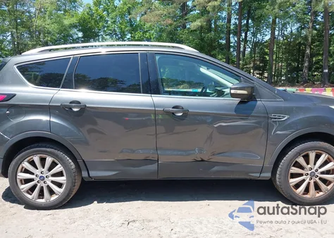 2017 Ford Escape Titanium z USA, uszkodzony, nr VIN 1FMCU9JD5HUD71601